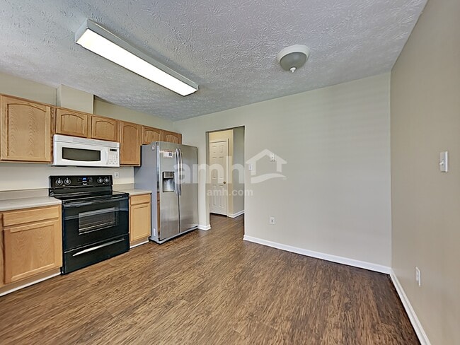 Building Photo - 7718 Edith Keeler Ln