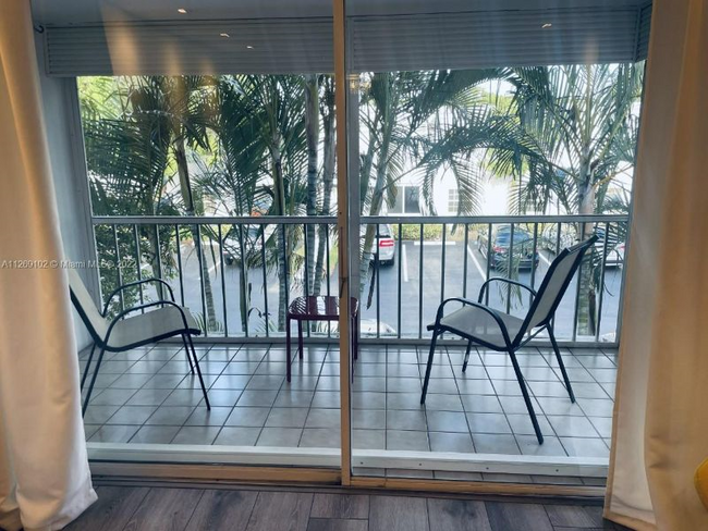 screened in balcony - 6397 Bay Club Dr