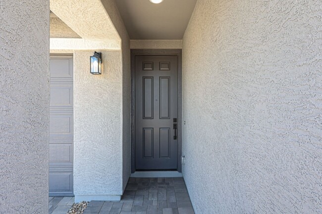Building Photo - Modern Mountainside Living: Stunning New 4-Bedroom Home in Estrella Crossing! 3 CAR GARAGE!