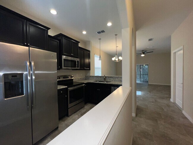 Building Photo - BEAUTIFUL Grande Champion at LPGA Townhome, Lake & Preserve Views, 3 Bedrooms, 2.5 Bathrooms AVAI...