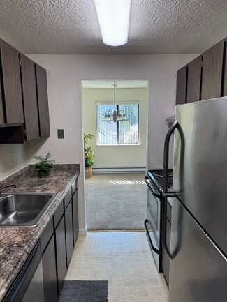 Kitchen to Dining Room View - Wellsforth Apartments