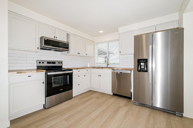 Building Photo - **Fully Remodeled 3+ Bedroom Home with Large Wraparound Deck – AVAILABLE NOW FOR RENT**