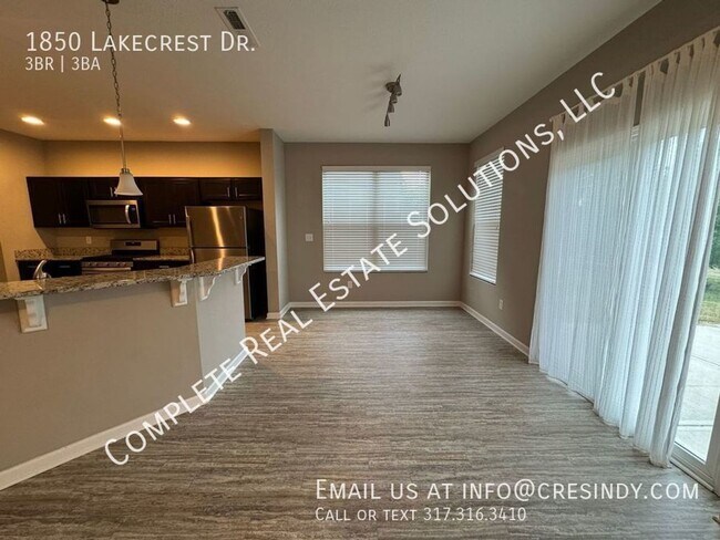 Building Photo - Now Showing this 3BR, 2 1/2 BA home locate...