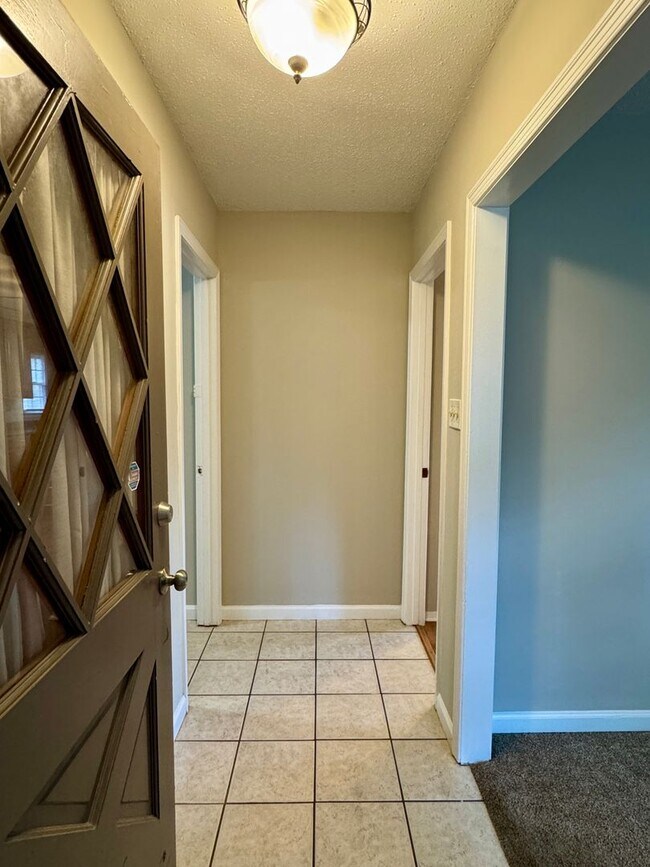Building Photo - Check Out This 3 Bedroom / 2 Bathroom BRIC...