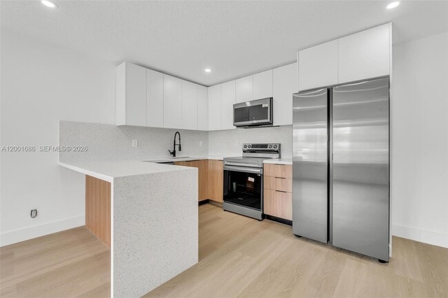 Building Photo - 1611 NE 50th Ct