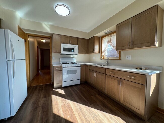 Foto del edificio - 5808 N Mulligan Ave