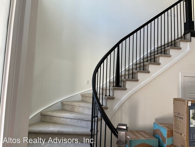 Building Photo - 5 br, 4.5 bath House - 6695 S. White Crow Ct.