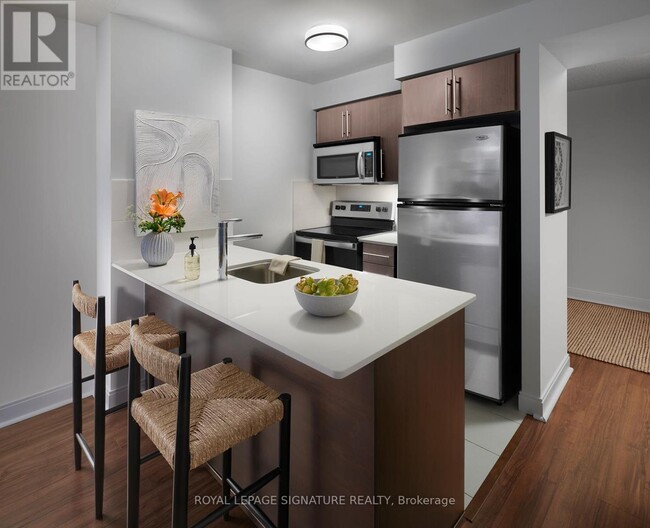 Photo du bâtiment - 105 Harrison Garden Blvd