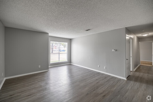 2BR, 2BA - 1,056SF - Living Room - The Grove on Brockington