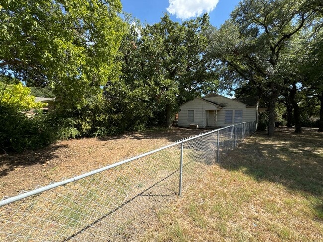 Building Photo - Denton Charmer with Big Yard, Carport & Flexible Living Space