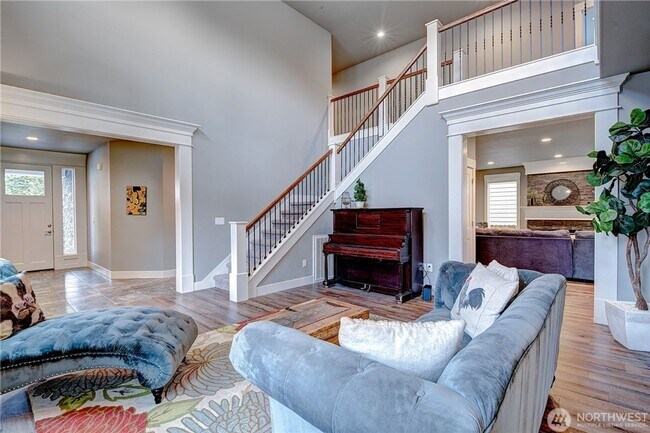 Building Photo - Luxury NW Living: 4 Bedroom Masterpiece with Dual Suites and Private Yard in Desirable Browns Point!