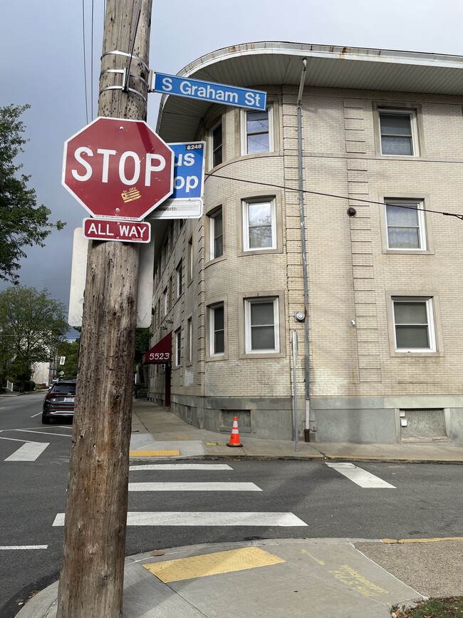 Bus stop at corner of Ellsworth AVe. and S. Graham St. - 5523 Ellsworth Ave
