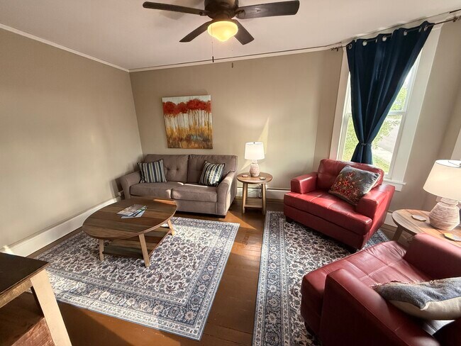 Lots of seating in the living room - 215 N Emmett Ave