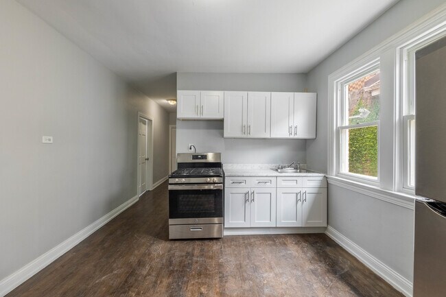 Foto del edificio - 6954 S Maplewood Ave