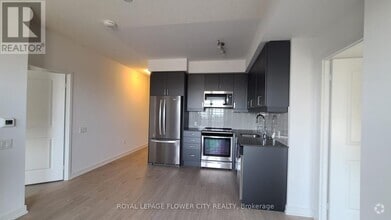 Building Photo - 8-3428 Nahani Way