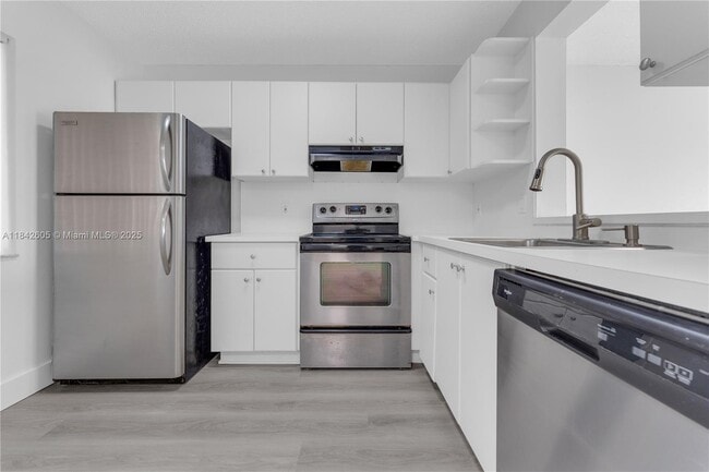 Building Photo - 8560 N Sherman Cir