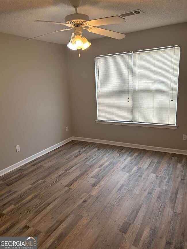 Building Photo - 7289 Wagon Wheel Ct
