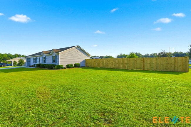 Building Photo - Beautiful Like-New 3 Bedroom Home with Huge Fenced Yard, Greenhouse & Storage