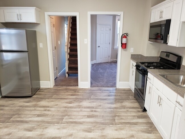 Building Photo - renovated 2-bedroom 2nd & 3rd floor apartment