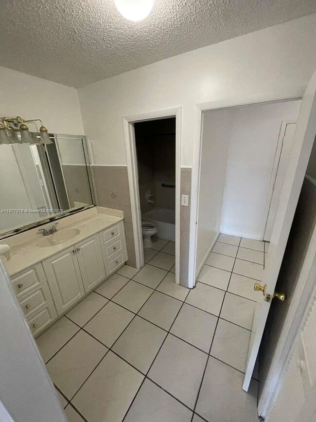 Building Photo - 6095 W 19th Ave