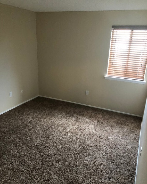 Building Photo - Bright 2 Bed/1 Bath Condo with Garage for ...