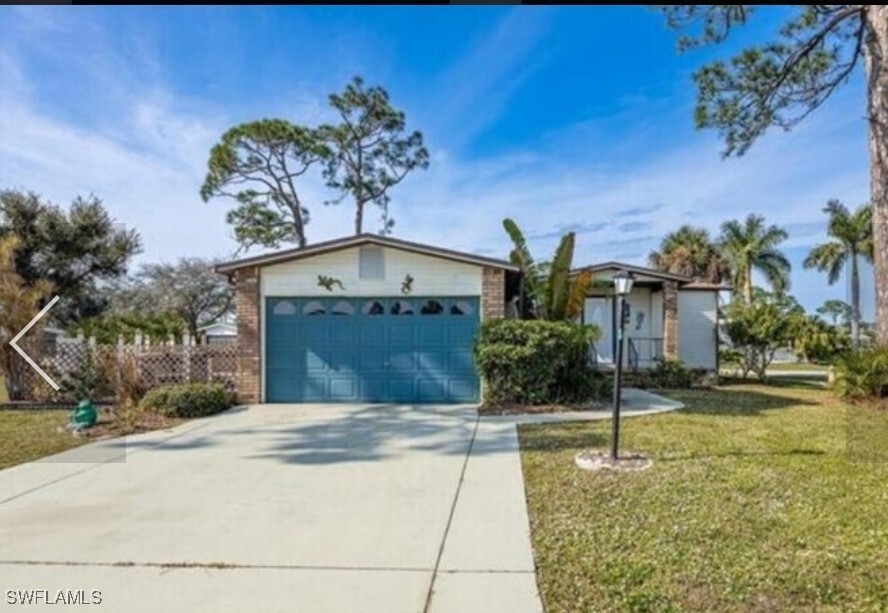 Foto principal - 10091 Broken Woods Ct