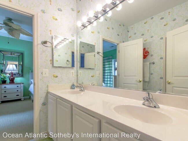 Building Photo - 4 br, 3.5 bath House - 27606 S Nicklaus Ave