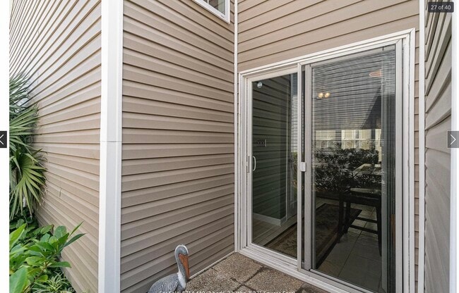 Back patio space for a grill - 203 Lyons Cove Dr