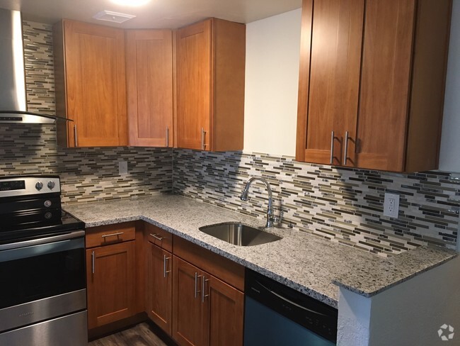 Building Photo - HIGHLANDER APARTMENTS