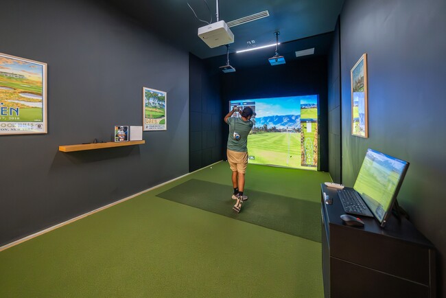 Catch 18 holes without leaving the comfort of home at the Shoreline's state-of-the-art golf simulator - SoLe Mia Rentals