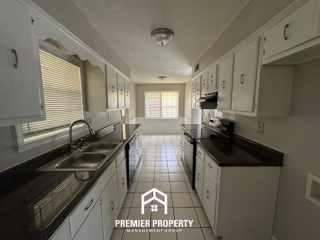 Building Photo - Gorgeous 4BR/2BA Bartlett Home with Brick Fireplace & Spacious Fenced Yard!