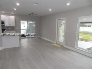 Building Photo - 6540 W 11th Ln