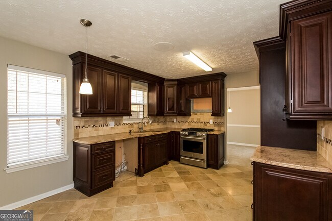 Foto del edificio - 6650 Etterlee Dr