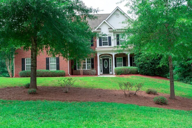 Building Photo - Executive Home with 5 Bedrooms and 3 Full ...