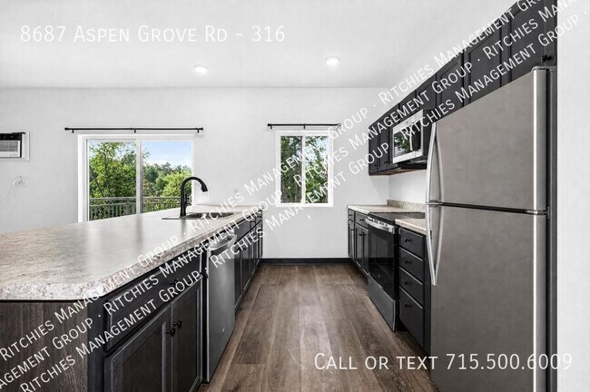 Building Photo - 8687 Aspen Ln