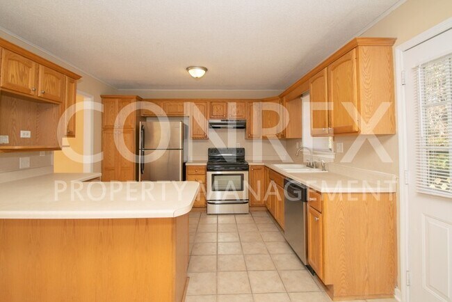 Building Photo - Welcome Home to this Charming Three Bedroom