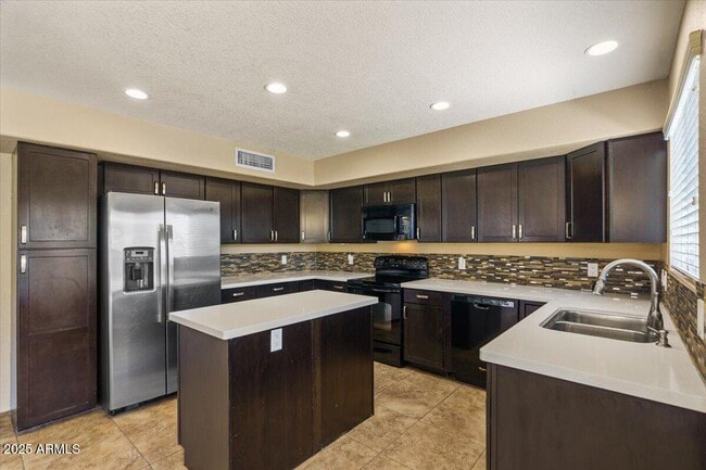 Building Photo - 5709 E Gelding Dr