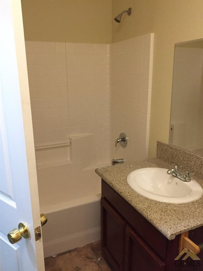 Granite top and Tile flooring on Baths - 318 S Owens St