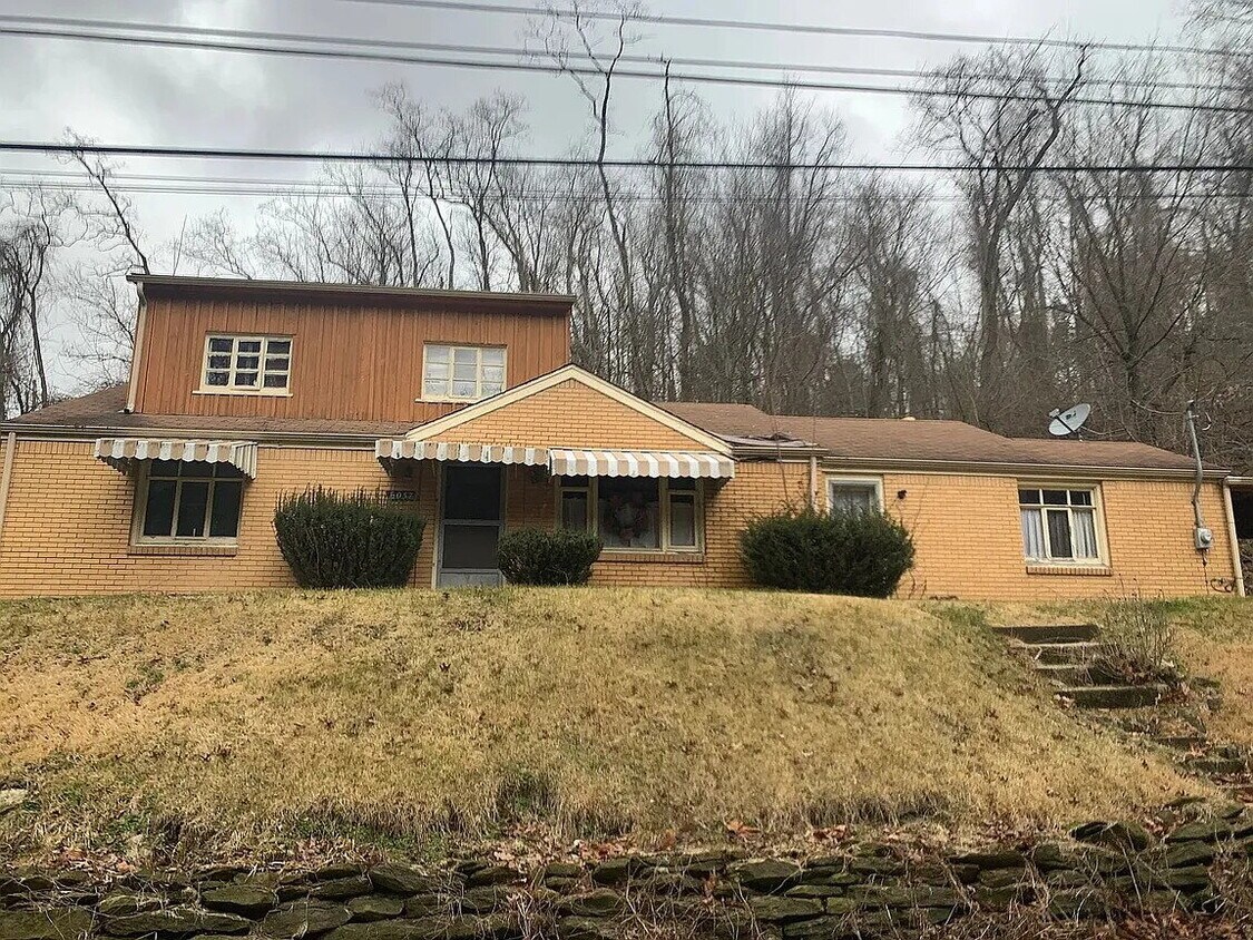 Building Photo - Introducing this attractively updated 4-bedroom, 1-bath home on Poketa Rd.