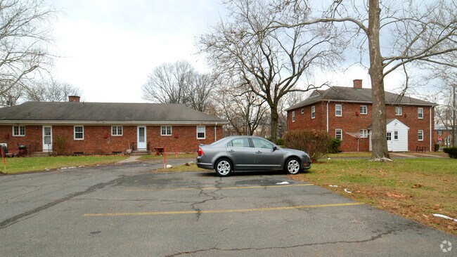 Side of Building with Parking - McKee Street Apartments