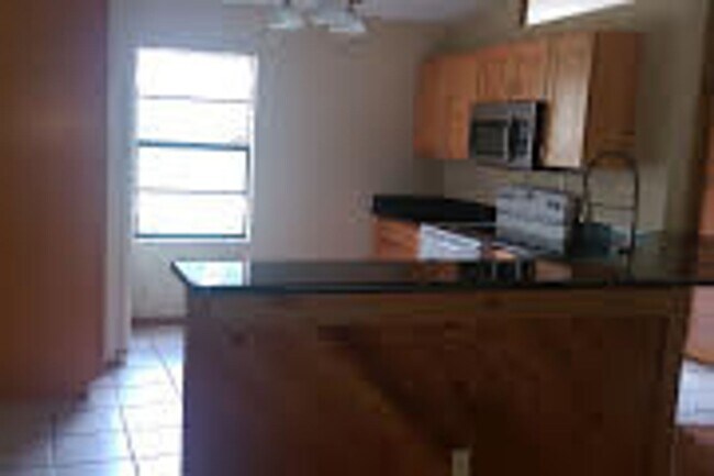 Building Photo - Pet friendly pool home with 3 bedrooms and...