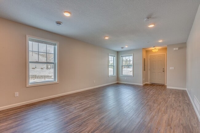 Building Photo - FOR RENT avail April 01: 3bd2ba2car garage END UNIT modern townhome