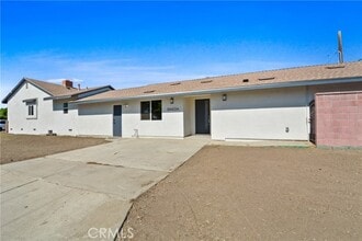 Building Photo - 10452 Casanes Ave