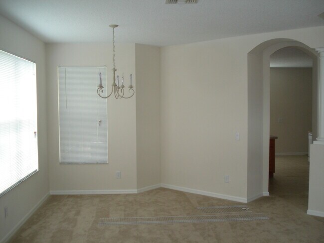 Building Photo - Eagle Creek at Lake Nona. 4/2.5 with Conservation View. Lawn Care Included with Rent!!