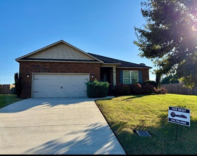 Building Photo - Fenced Yard with a HUGE Back Yard