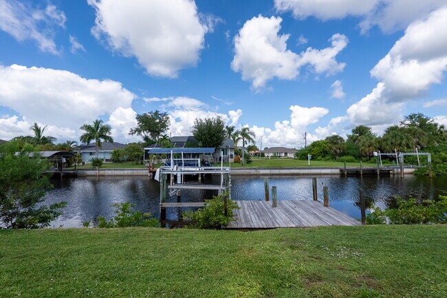 Building Photo - 3 BEDROOM • 2 BATHROOM • PRIVATE POOL • WATERFRONT • BOAT LIFT • ZERO DEPOSIT MOVE-IN AVAILABLE