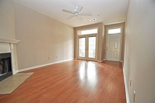 Front door and French doors to patio - 704 Woodland Creek Way
