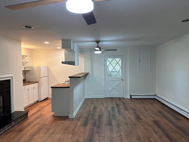 View of the living dining area toward the entrance - 734 Lyons Ave