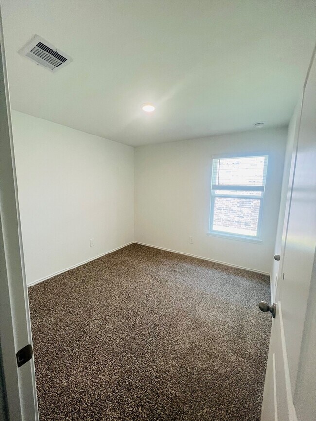 Foto del edificio - 5215 Mossdale Blf Ln