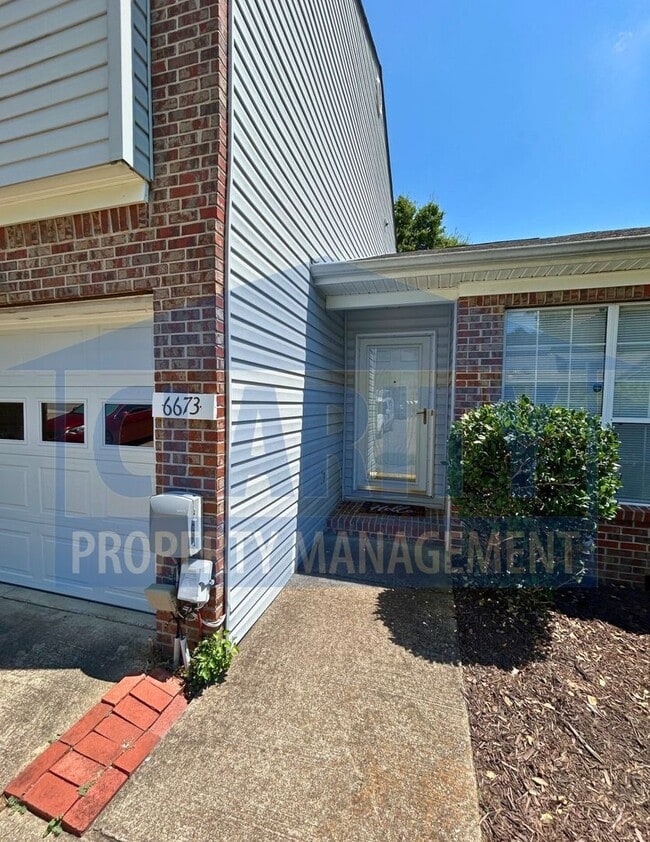 Building Photo - 3-bedroom condo w/ attached garage!